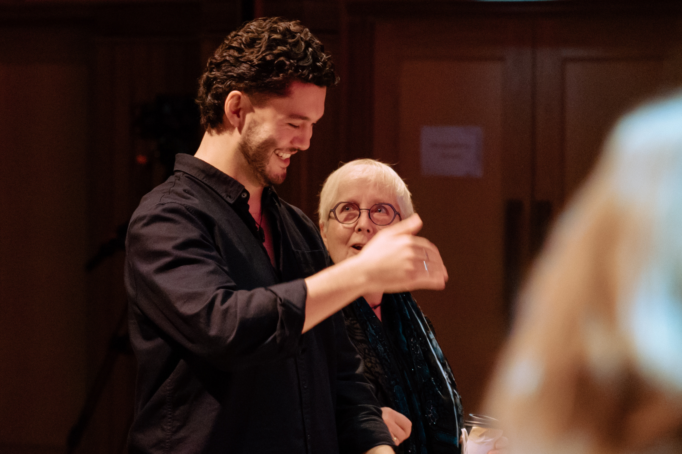 Conductor Reuben Brown being mentored by Dr. Karen Grylls