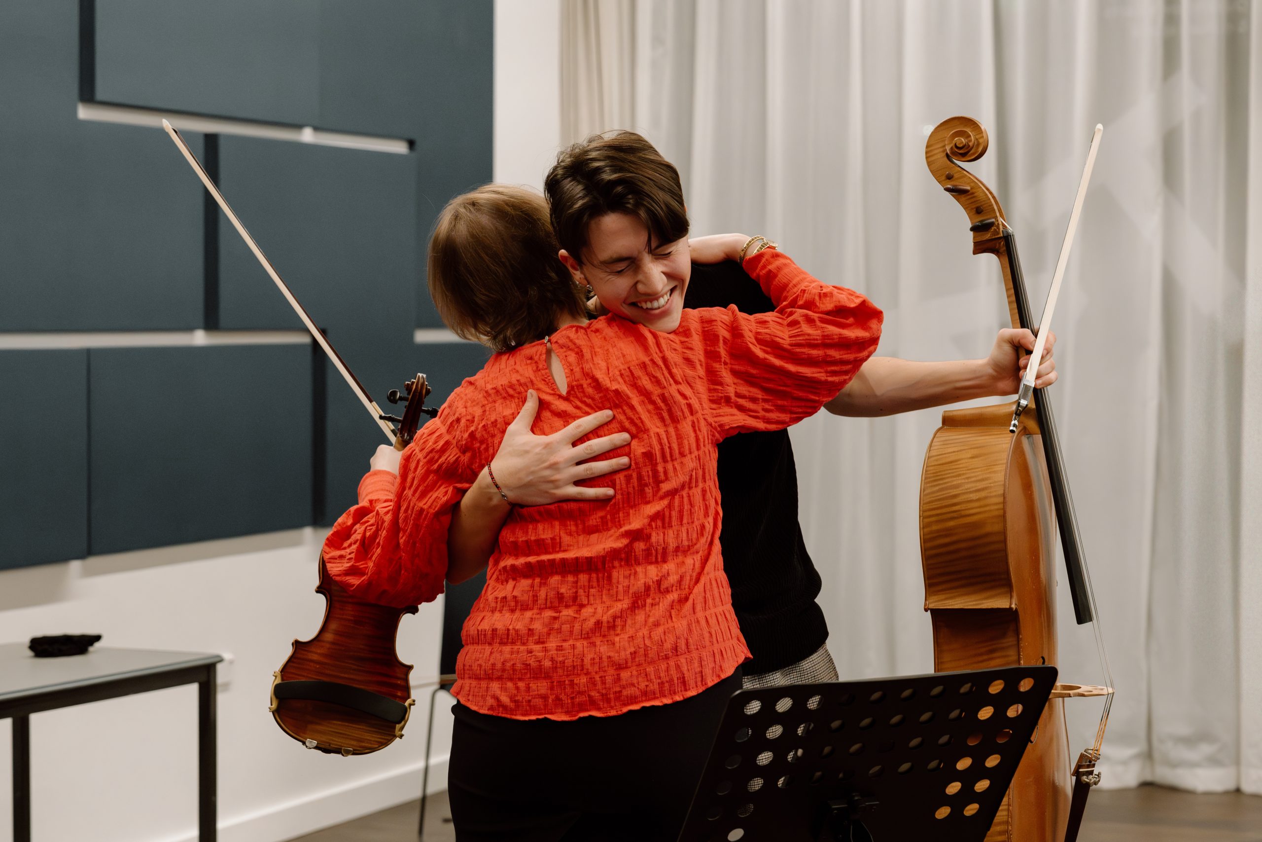 Ioana Cristina Goicea and Damon Herlihy-O'Brien share a hug
